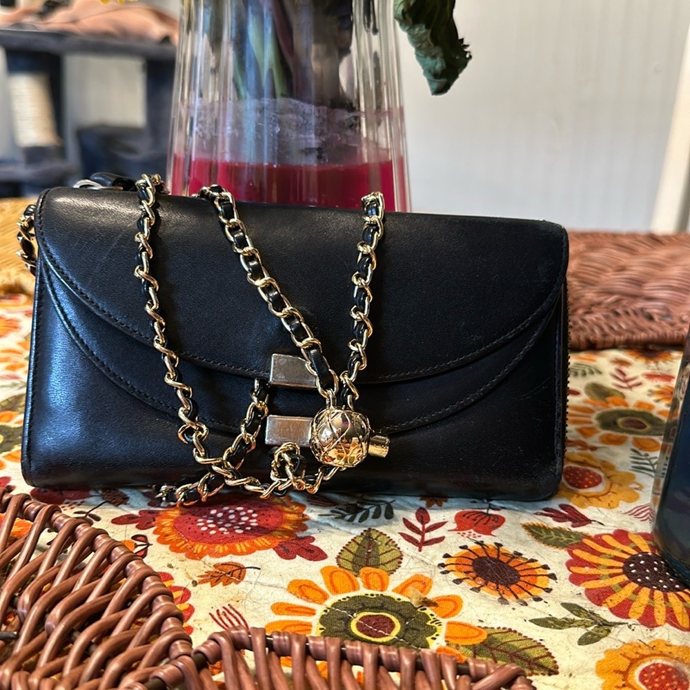 Chloe black double flap wallet on a chain